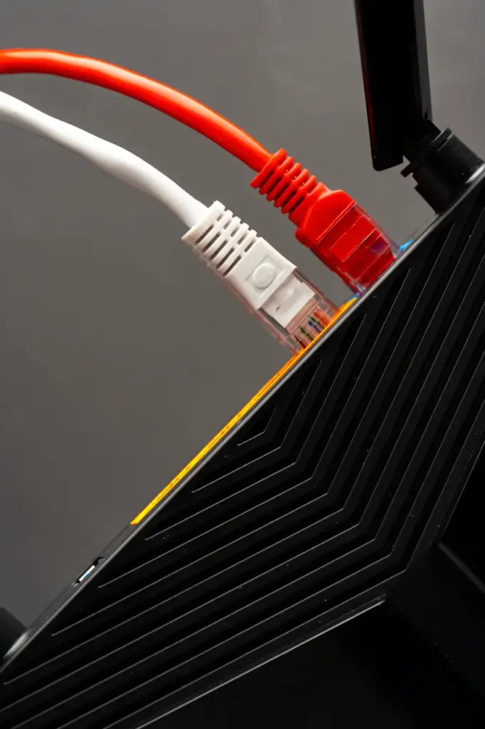 Modern router with cables plugged in close up 2025 02 25 05 42 24 utc