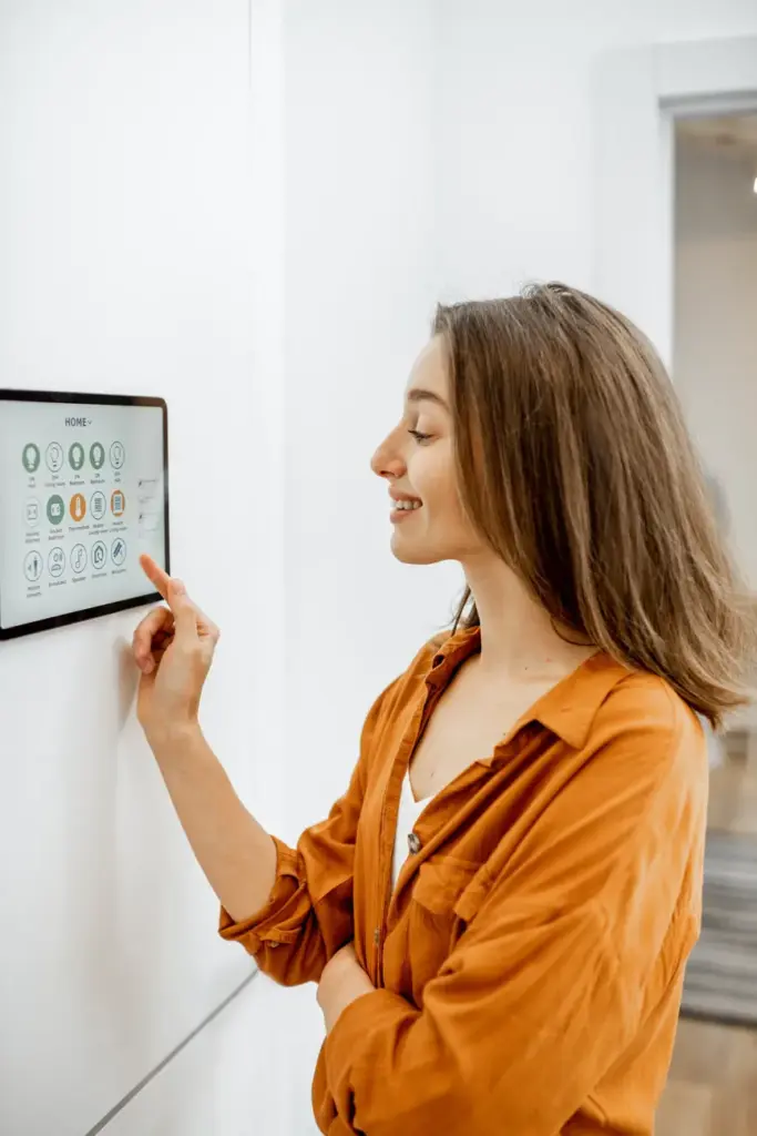 Woman controlling smart devices with a digital tab 2025 03 31 06 06 01 utc